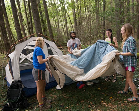 WLEE Students setting up a tent